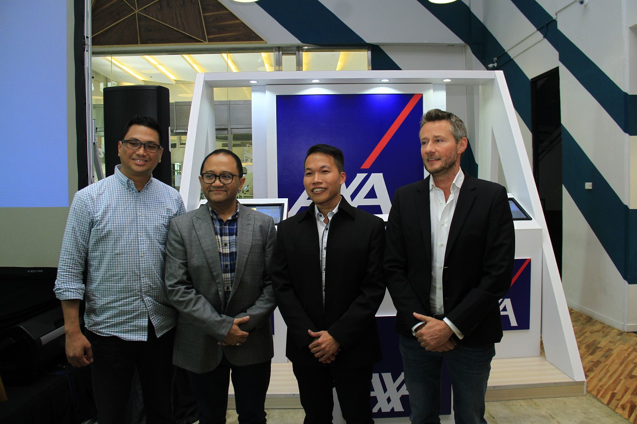 (ki-ka) Dody Wijaya, Vice President Merchant Business, DOKU; Kameswara Natakusumah, Chief Commercial Officer, AXA General Insurance Indonesia; Edwin Sugianto, Chief Operating Officer, AXA General Insurance Indonesia; dan Juan Cazcarra, Chief Financial Officer, AXA General Insurance Indonesia dalam konferensi pers peluncuran AXA MyPage / AXA GI