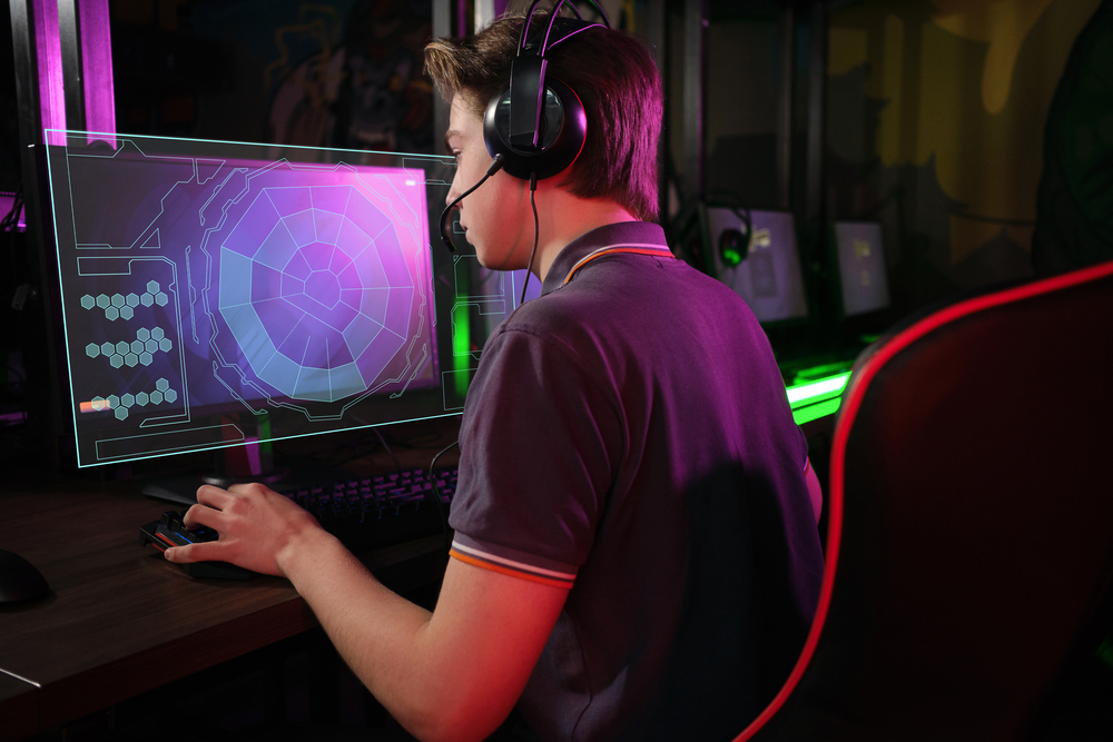 Cyber sport. Fully concentrated professional cybersport player playing important match for SEO